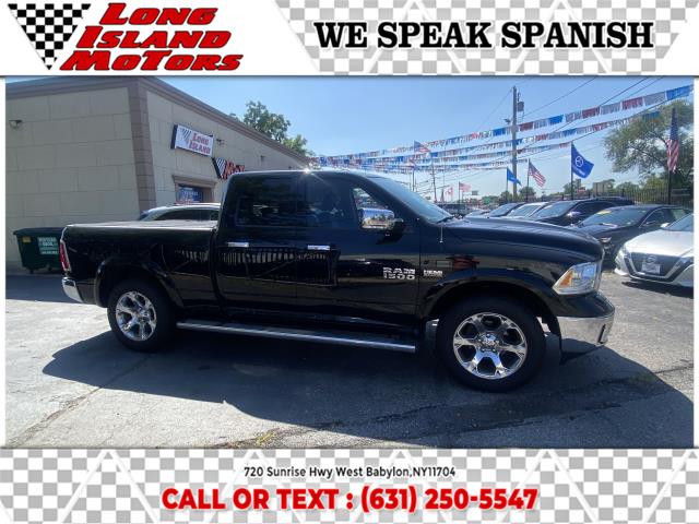 2014 Ram 1500 4WD Quad Cab 140.5" Laramie, available for sale in West Babylon, New York | Long Island Motors. West Babylon, New York 2014 Ram 1500 4WD Quad Cab 140.5" Laramie, available for sale in West Babylon, New York | Long Island Motors. West Babylon, New York