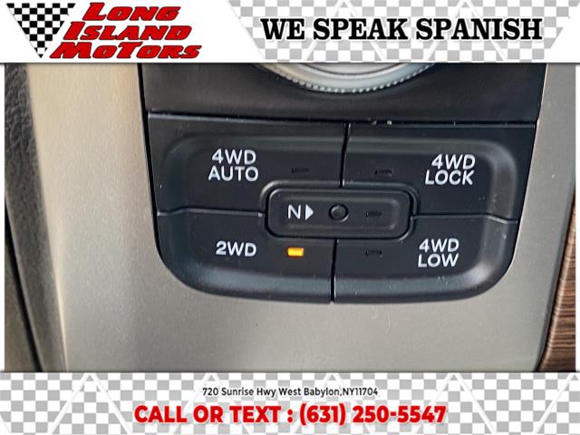 2014 Ram 1500 4WD Quad Cab 140.5" Laramie, available for sale in West Babylon, New York | Long Island Motors. West Babylon, New York 2014 Ram 1500 4WD Quad Cab 140.5" Laramie, available for sale in West Babylon, New York | Long Island Motors. West Babylon, New York