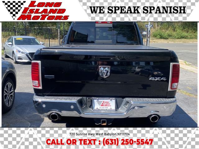 2014 Ram 1500 4WD Quad Cab 140.5" Laramie, available for sale in West Babylon, New York | Long Island Motors. West Babylon, New York 2014 Ram 1500 4WD Quad Cab 140.5" Laramie, available for sale in West Babylon, New York | Long Island Motors. West Babylon, New York