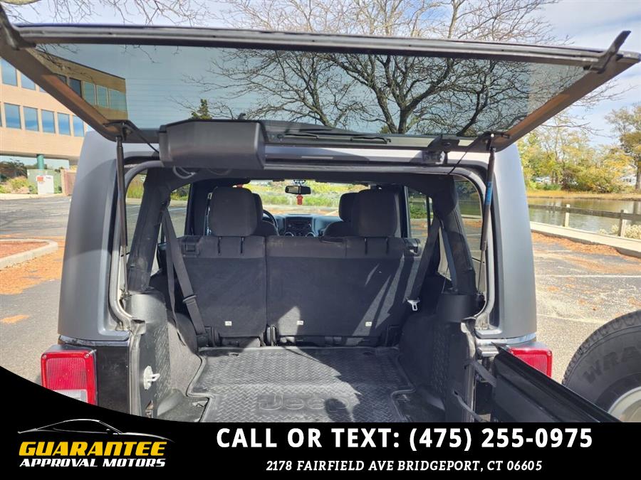 2016 Jeep Wrangler Unlimited Sport S 4x4 4dr SUV, available for sale in Bridgeport, Connecticut | Guarantee Approval Motors. Bridgeport, Connecticut 2016 Jeep Wrangler Unlimited Sport S 4x4 4dr SUV, available for sale in Bridgeport, Connecticut | Guarantee Approval Motors. Bridgeport, Connecticut