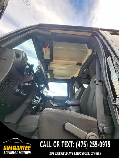2016 Jeep Wrangler Unlimited Sport S 4x4 4dr SUV, available for sale in Bridgeport, Connecticut | Guarantee Approval Motors. Bridgeport, Connecticut 2016 Jeep Wrangler Unlimited Sport S 4x4 4dr SUV, available for sale in Bridgeport, Connecticut | Guarantee Approval Motors. Bridgeport, Connecticut