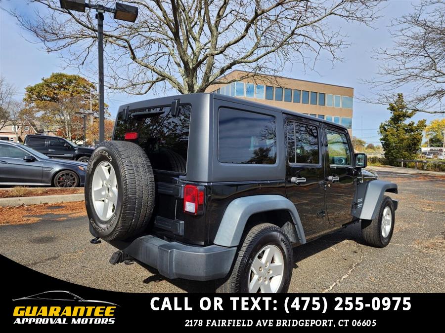 2016 Jeep Wrangler Unlimited Sport S 4x4 4dr SUV, available for sale in Bridgeport, Connecticut | Guarantee Approval Motors. Bridgeport, Connecticut 2016 Jeep Wrangler Unlimited Sport S 4x4 4dr SUV, available for sale in Bridgeport, Connecticut | Guarantee Approval Motors. Bridgeport, Connecticut