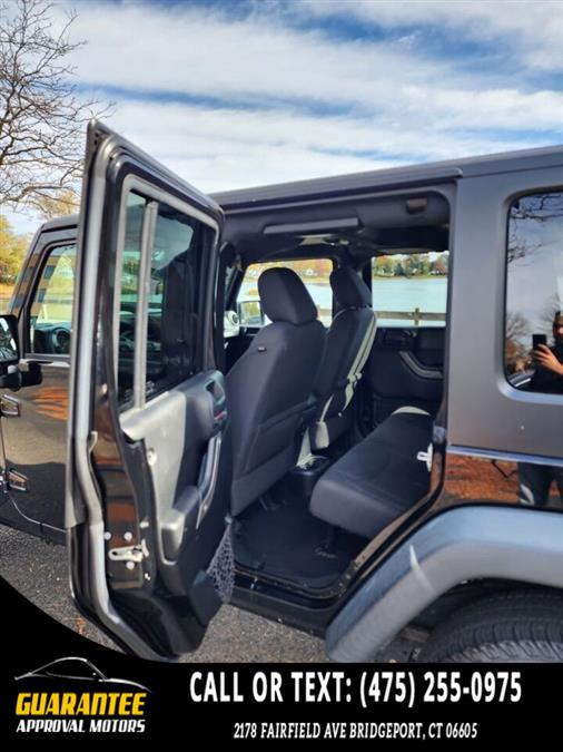 2016 Jeep Wrangler Unlimited Sport S 4x4 4dr SUV, available for sale in Bridgeport, Connecticut | Guarantee Approval Motors. Bridgeport, Connecticut 2016 Jeep Wrangler Unlimited Sport S 4x4 4dr SUV, available for sale in Bridgeport, Connecticut | Guarantee Approval Motors. Bridgeport, Connecticut
