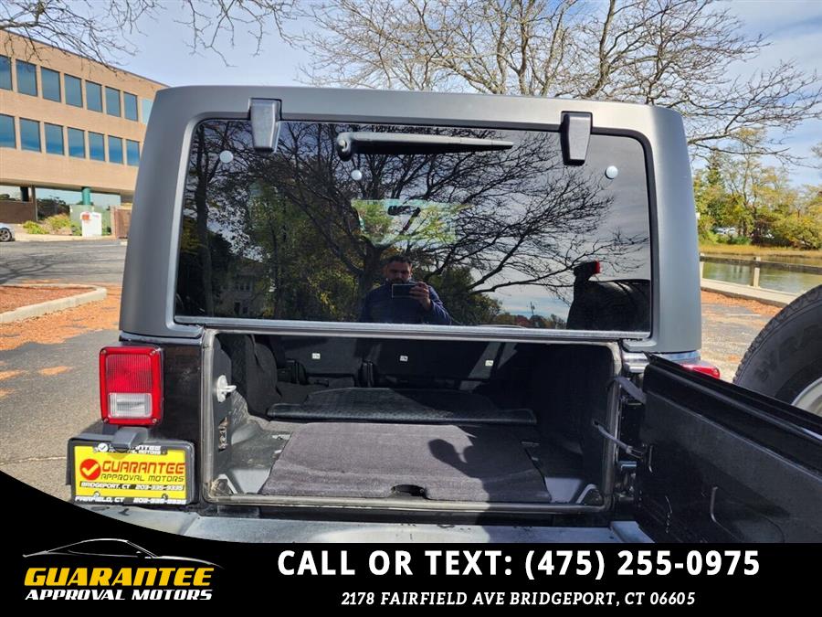 2016 Jeep Wrangler Unlimited Sport S 4x4 4dr SUV, available for sale in Bridgeport, Connecticut | Guarantee Approval Motors. Bridgeport, Connecticut 2016 Jeep Wrangler Unlimited Sport S 4x4 4dr SUV, available for sale in Bridgeport, Connecticut | Guarantee Approval Motors. Bridgeport, Connecticut