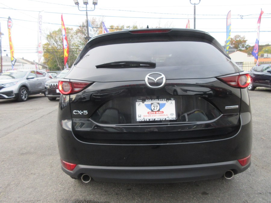 Used Mazda CX-5 Touring FWD 2021 | Route 27 Auto Mall. Linden, New Jersey Used Mazda CX-5 Touring FWD 2021 | Route 27 Auto Mall. Linden, New Jersey