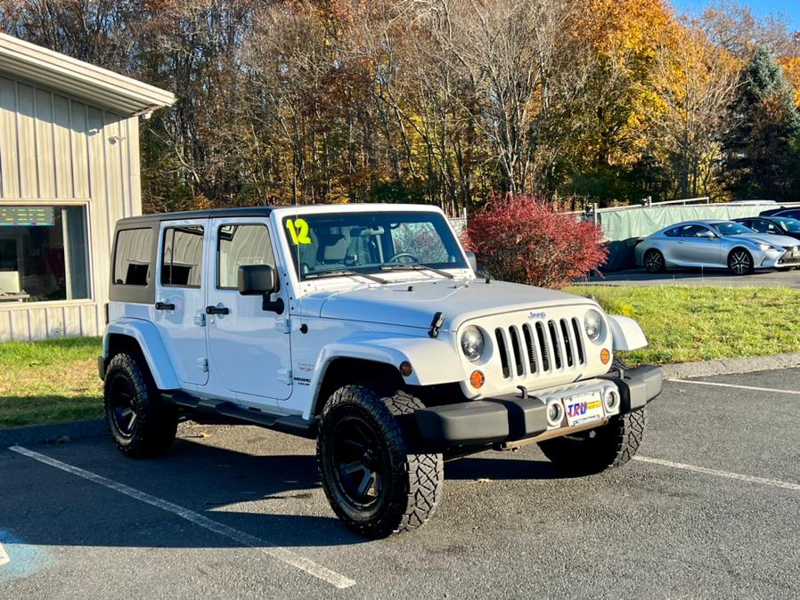 2012 Jeep Wrangler Unlimited 4WD 4dr SAHARA, available for sale in Berlin, Connecticut | Tru Auto Mall. Berlin, Connecticut 2012 Jeep Wrangler Unlimited 4WD 4dr SAHARA, available for sale in Berlin, Connecticut | Tru Auto Mall. Berlin, Connecticut