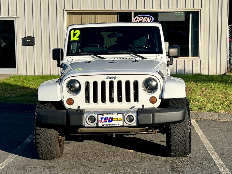 2012 Jeep Wrangler Unlimited 4WD 4dr SAHARA, available for sale in Berlin, Connecticut | Tru Auto Mall. Berlin, Connecticut 2012 Jeep Wrangler Unlimited 4WD 4dr SAHARA, available for sale in Berlin, Connecticut | Tru Auto Mall. Berlin, Connecticut
