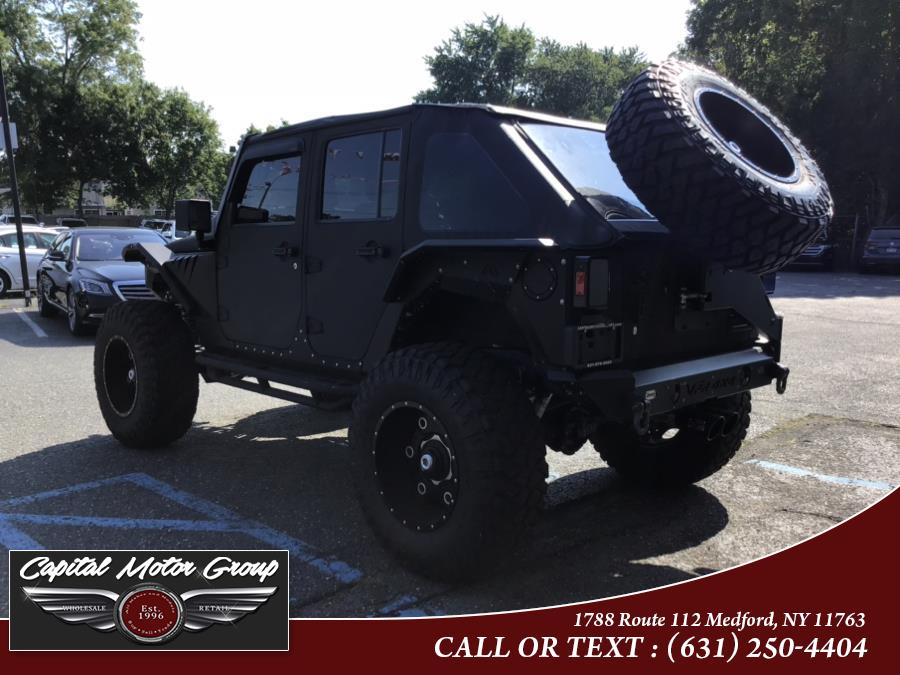 2015 Jeep Wrangler Unlimited 4WD 4dr Rubicon, available for sale in Medford, New York | Capital Motor Group Inc. Medford, New York 2015 Jeep Wrangler Unlimited 4WD 4dr Rubicon, available for sale in Medford, New York | Capital Motor Group Inc. Medford, New York