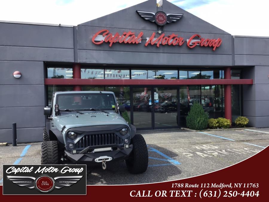 Used Jeep Wrangler 4WD 2dr Willys Wheeler 2015 | Capital Motor Group Inc. Medford, New York Used Jeep Wrangler 4WD 2dr Willys Wheeler 2015 | Capital Motor Group Inc. Medford, New York