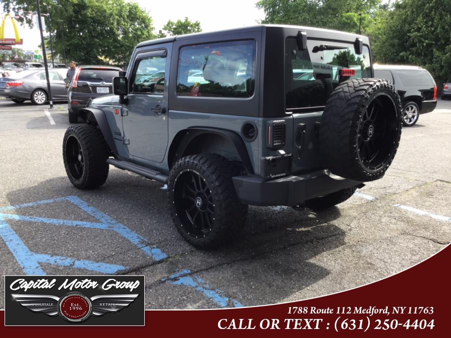 Used Jeep Wrangler 4WD 2dr Willys Wheeler 2015 | Capital Motor Group Inc. Medford, New York Used Jeep Wrangler 4WD 2dr Willys Wheeler 2015 | Capital Motor Group Inc. Medford, New York