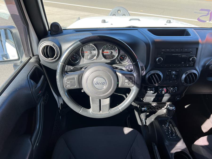 2013 Jeep Wrangler Unlimited 4WD 4dr Freedom Edition *Ltd Avail*, available for sale in Branford, Connecticut | Al Mac Motors 2. Branford, Connecticut 2013 Jeep Wrangler Unlimited 4WD 4dr Freedom Edition *Ltd Avail*, available for sale in Branford, Connecticut | Al Mac Motors 2. Branford, Connecticut