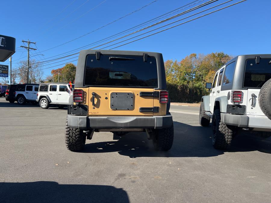 2013 Jeep Wrangler Unlimited 4WD 4dr Sahara, available for sale in Branford, Connecticut | Al Mac Motors 2. Branford, Connecticut 2013 Jeep Wrangler Unlimited 4WD 4dr Sahara, available for sale in Branford, Connecticut | Al Mac Motors 2. Branford, Connecticut