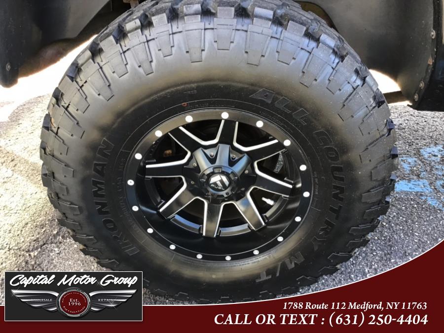 Used Ram 1500 4WD Quad Cab 140.5" SLT 2012 | Capital Motor Group Inc. Medford, New York Used Ram 1500 4WD Quad Cab 140.5" SLT 2012 | Capital Motor Group Inc. Medford, New York