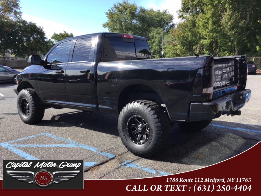 Used Ram 1500 4WD Quad Cab 140.5" SLT 2012 | Capital Motor Group Inc. Medford, New York Used Ram 1500 4WD Quad Cab 140.5" SLT 2012 | Capital Motor Group Inc. Medford, New York