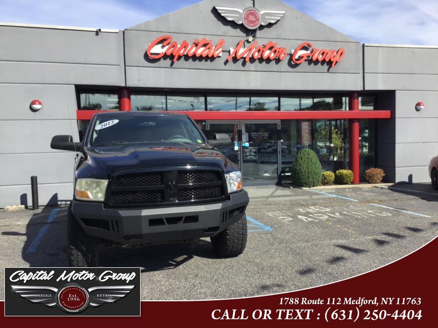 Used Ram 1500 4WD Quad Cab 140.5" SLT 2012 | Capital Motor Group Inc. Medford, New York Used Ram 1500 4WD Quad Cab 140.5" SLT 2012 | Capital Motor Group Inc. Medford, New York