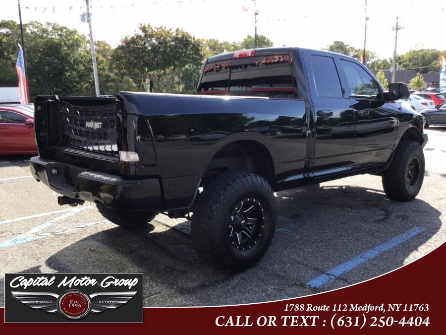 Used Ram 1500 4WD Quad Cab 140.5" SLT 2012 | Capital Motor Group Inc. Medford, New York Used Ram 1500 4WD Quad Cab 140.5" SLT 2012 | Capital Motor Group Inc. Medford, New York