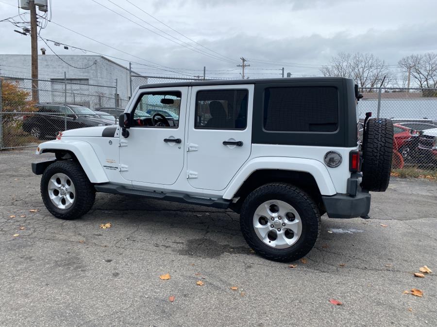 Used Jeep Wrangler Unlimited 4WD 4dr Sahara 2014 | Dealertown Auto Wholesalers. Milford, Connecticut Used Jeep Wrangler Unlimited 4WD 4dr Sahara 2014 | Dealertown Auto Wholesalers. Milford, Connecticut
