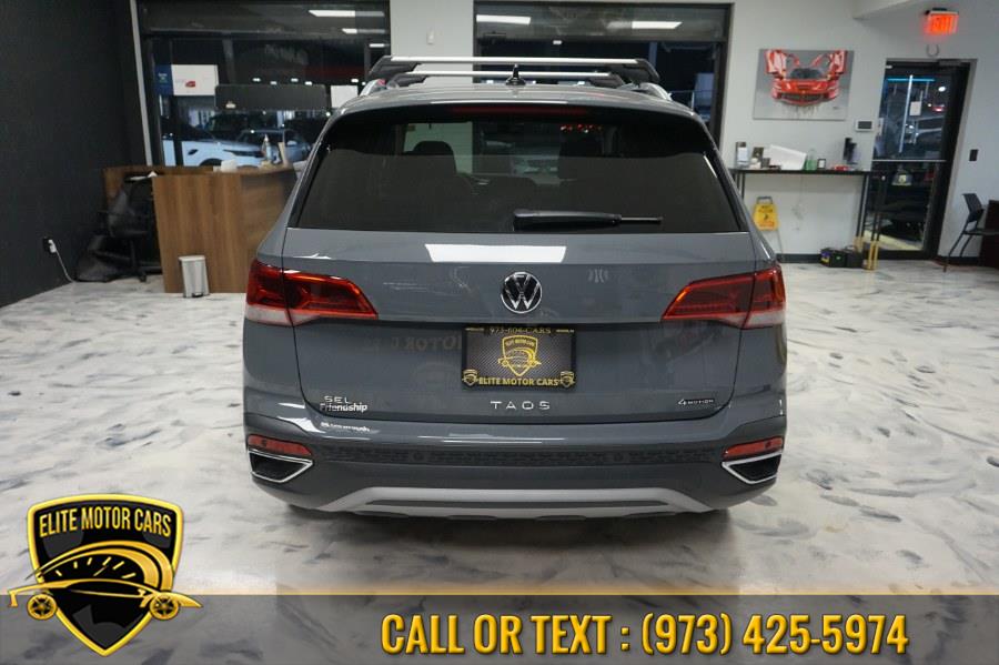 2022 Volkswagen Taos SEL 4MOTION, available for sale in Newark, New Jersey | Elite Motor Cars. Newark, New Jersey 2022 Volkswagen Taos SEL 4MOTION, available for sale in Newark, New Jersey | Elite Motor Cars. Newark, New Jersey
