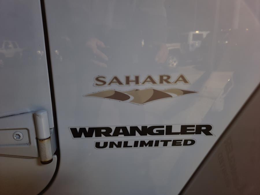 2013 Jeep Wrangler Unlimited 4WD 4dr Sahara, available for sale in Milford, Connecticut | Chip's Auto Sales Inc. Milford, Connecticut 2013 Jeep Wrangler Unlimited 4WD 4dr Sahara, available for sale in Milford, Connecticut | Chip's Auto Sales Inc. Milford, Connecticut