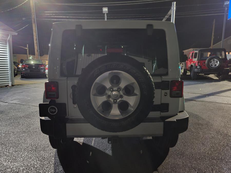 2013 Jeep Wrangler Unlimited 4WD 4dr Sahara, available for sale in Milford, Connecticut | Chip's Auto Sales Inc. Milford, Connecticut 2013 Jeep Wrangler Unlimited 4WD 4dr Sahara, available for sale in Milford, Connecticut | Chip's Auto Sales Inc. Milford, Connecticut