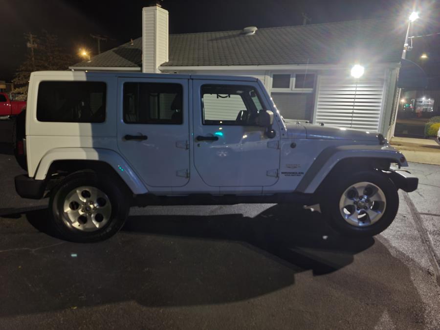 2013 Jeep Wrangler Unlimited 4WD 4dr Sahara, available for sale in Milford, Connecticut | Chip's Auto Sales Inc. Milford, Connecticut 2013 Jeep Wrangler Unlimited 4WD 4dr Sahara, available for sale in Milford, Connecticut | Chip's Auto Sales Inc. Milford, Connecticut