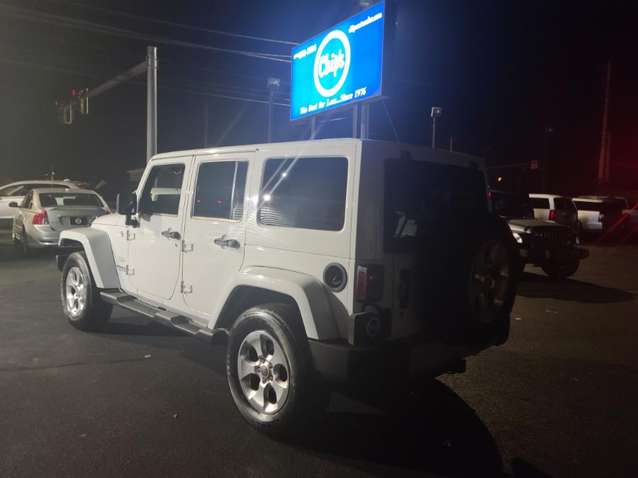 2013 Jeep Wrangler Unlimited 4WD 4dr Sahara, available for sale in Milford, Connecticut | Chip's Auto Sales Inc. Milford, Connecticut 2013 Jeep Wrangler Unlimited 4WD 4dr Sahara, available for sale in Milford, Connecticut | Chip's Auto Sales Inc. Milford, Connecticut