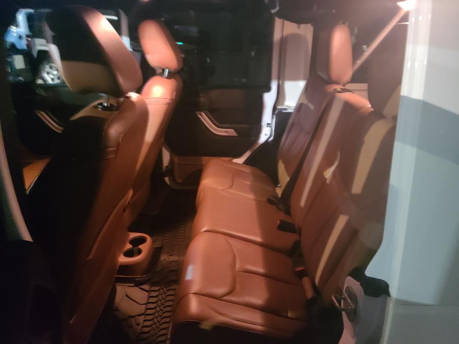 2013 Jeep Wrangler Unlimited 4WD 4dr Sahara, available for sale in Milford, Connecticut | Chip's Auto Sales Inc. Milford, Connecticut 2013 Jeep Wrangler Unlimited 4WD 4dr Sahara, available for sale in Milford, Connecticut | Chip's Auto Sales Inc. Milford, Connecticut