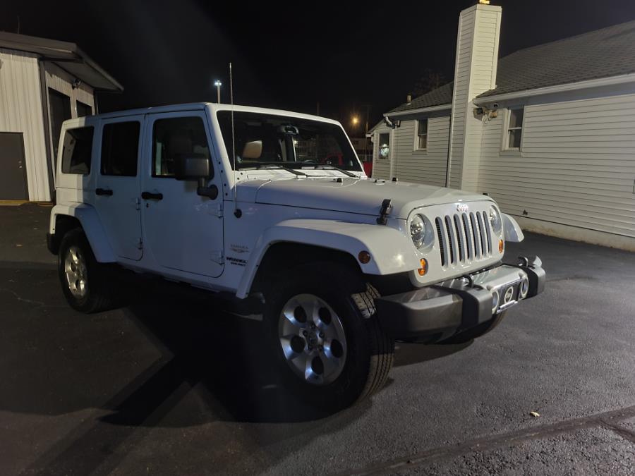 2013 Jeep Wrangler Unlimited 4WD 4dr Sahara, available for sale in Milford, Connecticut | Chip's Auto Sales Inc. Milford, Connecticut 2013 Jeep Wrangler Unlimited 4WD 4dr Sahara, available for sale in Milford, Connecticut | Chip's Auto Sales Inc. Milford, Connecticut