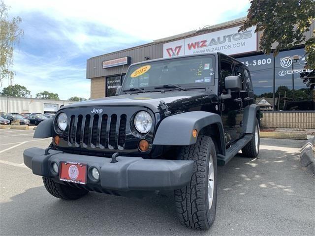 2012 Jeep Wrangler Unlimited Sport, available for sale in Stratford, Connecticut | Wiz Leasing Inc. Stratford, Connecticut