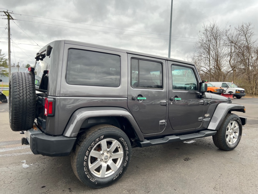 2014 Jeep Wrangler Unlimited 4WD 4dr Sahara, available for sale in Ortonville, Michigan | Marsh Auto Sales LLC. Ortonville, Michigan 2014 Jeep Wrangler Unlimited 4WD 4dr Sahara, available for sale in Ortonville, Michigan | Marsh Auto Sales LLC. Ortonville, Michigan