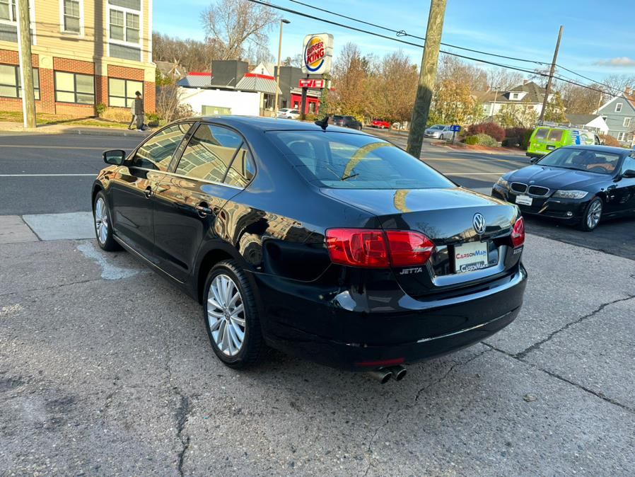 2013 Volkswagen Jetta Sedan 4dr Auto SEL w/Nav, available for sale in Manchester, Connecticut | Carsonmain LLC. Manchester, Connecticut 2013 Volkswagen Jetta Sedan 4dr Auto SEL w/Nav, available for sale in Manchester, Connecticut | Carsonmain LLC. Manchester, Connecticut