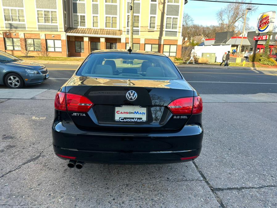 2013 Volkswagen Jetta Sedan 4dr Auto SEL w/Nav, available for sale in Manchester, Connecticut | Carsonmain LLC. Manchester, Connecticut 2013 Volkswagen Jetta Sedan 4dr Auto SEL w/Nav, available for sale in Manchester, Connecticut | Carsonmain LLC. Manchester, Connecticut