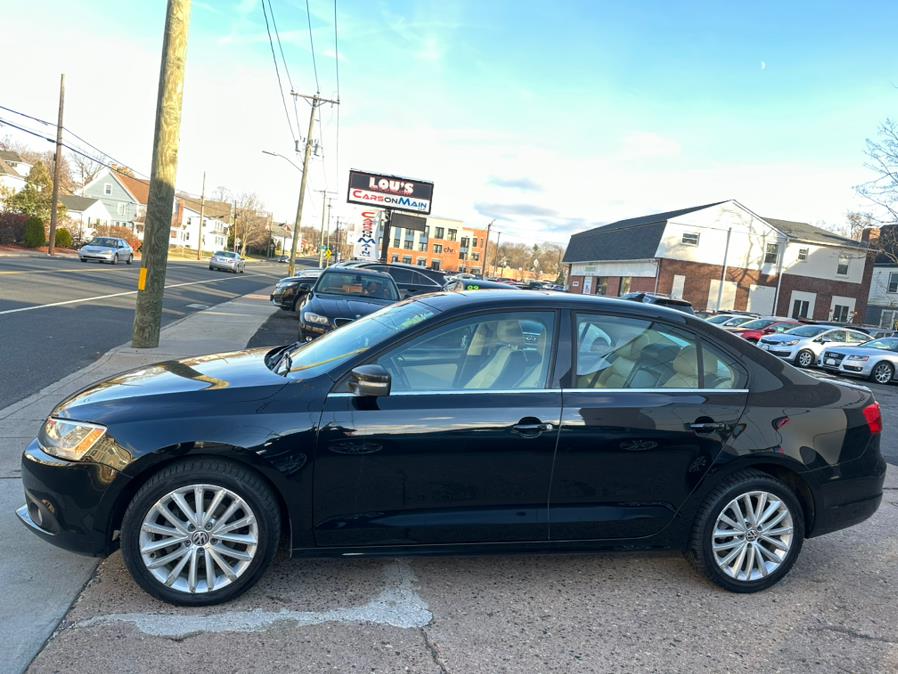 2013 Volkswagen Jetta Sedan 4dr Auto SEL w/Nav, available for sale in Manchester, Connecticut | Carsonmain LLC. Manchester, Connecticut 2013 Volkswagen Jetta Sedan 4dr Auto SEL w/Nav, available for sale in Manchester, Connecticut | Carsonmain LLC. Manchester, Connecticut