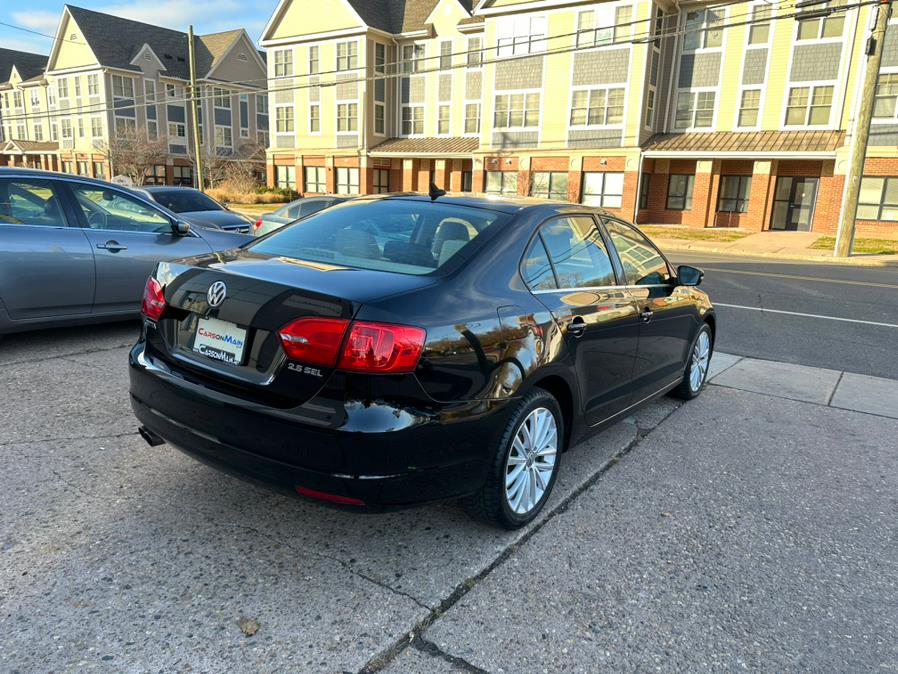 2013 Volkswagen Jetta Sedan 4dr Auto SEL w/Nav, available for sale in Manchester, Connecticut | Carsonmain LLC. Manchester, Connecticut 2013 Volkswagen Jetta Sedan 4dr Auto SEL w/Nav, available for sale in Manchester, Connecticut | Carsonmain LLC. Manchester, Connecticut