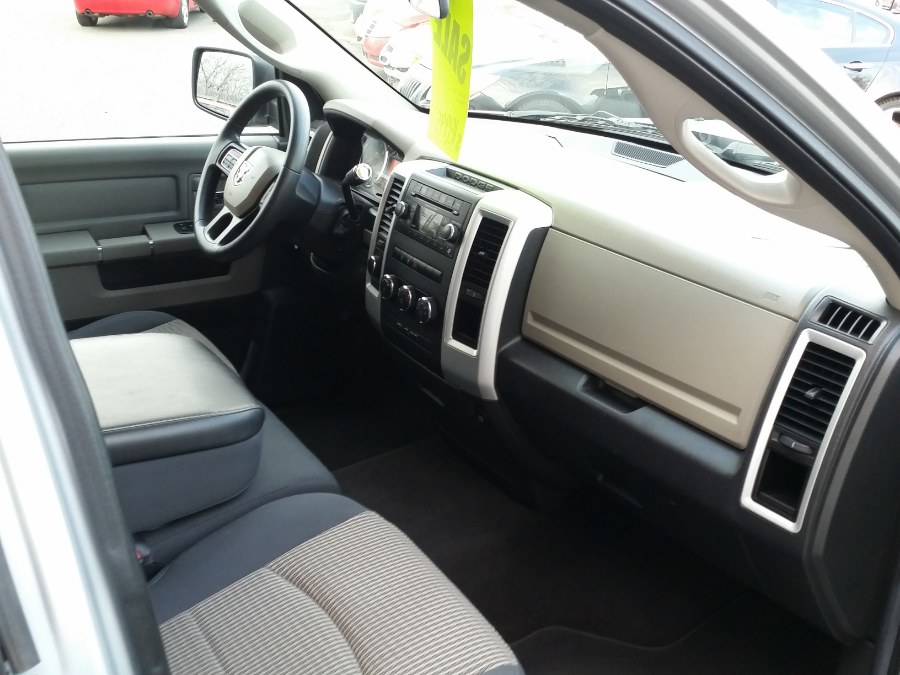 2012 Ram 1500 4WD Quad Cab 140.5" SLT, available for sale in Berlin, Connecticut | Action Automotive. Berlin, Connecticut 2012 Ram 1500 4WD Quad Cab 140.5" SLT, available for sale in Berlin, Connecticut | Action Automotive. Berlin, Connecticut