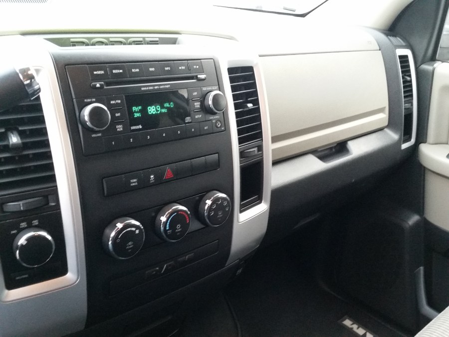 2012 Ram 1500 4WD Quad Cab 140.5" SLT, available for sale in Berlin, Connecticut | Action Automotive. Berlin, Connecticut 2012 Ram 1500 4WD Quad Cab 140.5" SLT, available for sale in Berlin, Connecticut | Action Automotive. Berlin, Connecticut