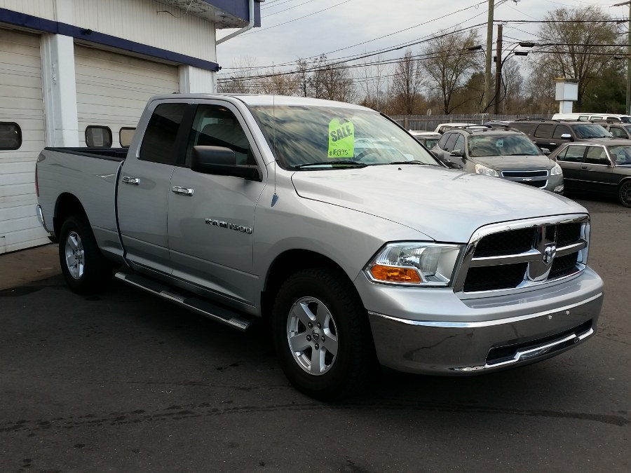 2012 Ram 1500 4WD Quad Cab 140.5" SLT, available for sale in Berlin, Connecticut | Action Automotive. Berlin, Connecticut 2012 Ram 1500 4WD Quad Cab 140.5" SLT, available for sale in Berlin, Connecticut | Action Automotive. Berlin, Connecticut