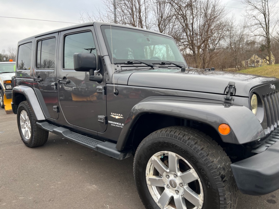 2014 Jeep Wrangler Unlimited 4WD 4dr Sahara, available for sale in Ortonville, Michigan | Marsh Auto Sales LLC. Ortonville, Michigan 2014 Jeep Wrangler Unlimited 4WD 4dr Sahara, available for sale in Ortonville, Michigan | Marsh Auto Sales LLC. Ortonville, Michigan