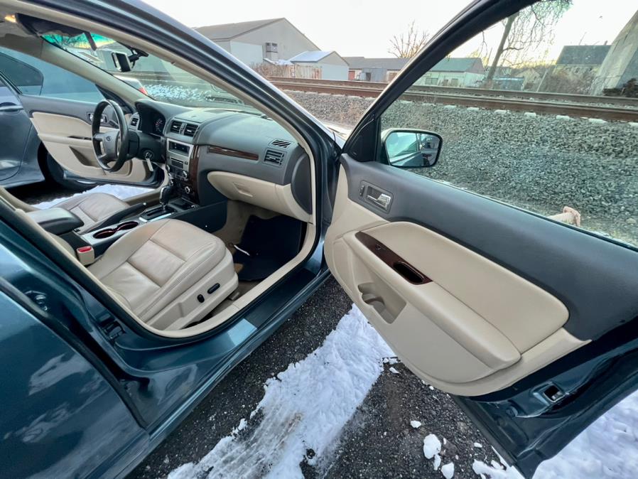2012 Ford Fusion 4dr Sdn SEL FWD, available for sale in Wallingford, Connecticut | Wallingford Auto Center LLC. Wallingford, Connecticut 2012 Ford Fusion 4dr Sdn SEL FWD, available for sale in Wallingford, Connecticut | Wallingford Auto Center LLC. Wallingford, Connecticut