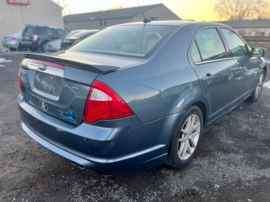 2012 Ford Fusion 4dr Sdn SEL FWD, available for sale in Wallingford, Connecticut | Wallingford Auto Center LLC. Wallingford, Connecticut 2012 Ford Fusion 4dr Sdn SEL FWD, available for sale in Wallingford, Connecticut | Wallingford Auto Center LLC. Wallingford, Connecticut