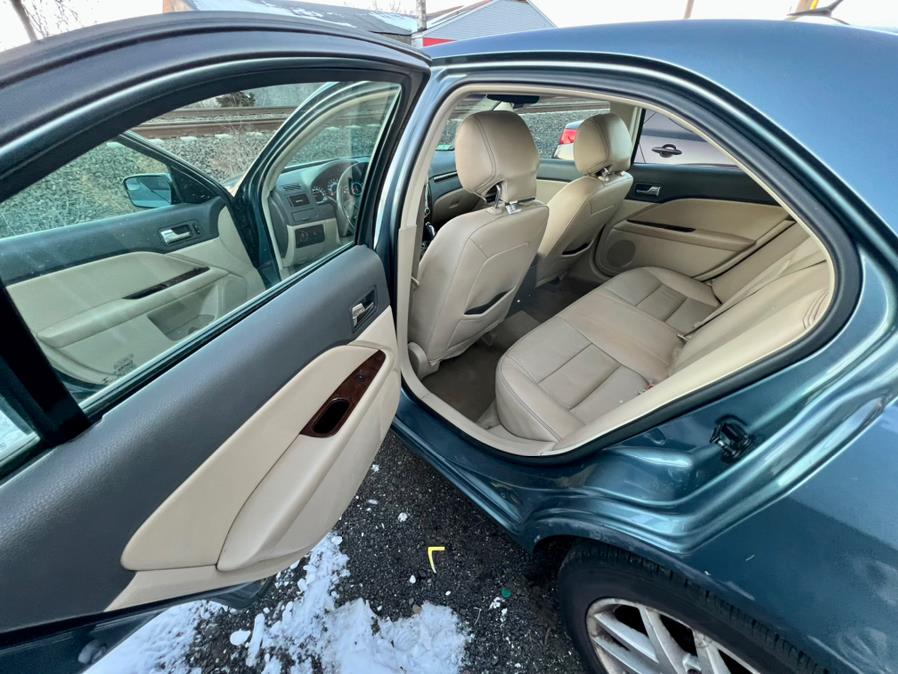 2012 Ford Fusion 4dr Sdn SEL FWD, available for sale in Wallingford, Connecticut | Wallingford Auto Center LLC. Wallingford, Connecticut 2012 Ford Fusion 4dr Sdn SEL FWD, available for sale in Wallingford, Connecticut | Wallingford Auto Center LLC. Wallingford, Connecticut