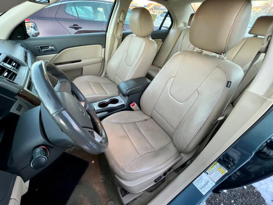 2012 Ford Fusion 4dr Sdn SEL FWD, available for sale in Wallingford, Connecticut | Wallingford Auto Center LLC. Wallingford, Connecticut 2012 Ford Fusion 4dr Sdn SEL FWD, available for sale in Wallingford, Connecticut | Wallingford Auto Center LLC. Wallingford, Connecticut