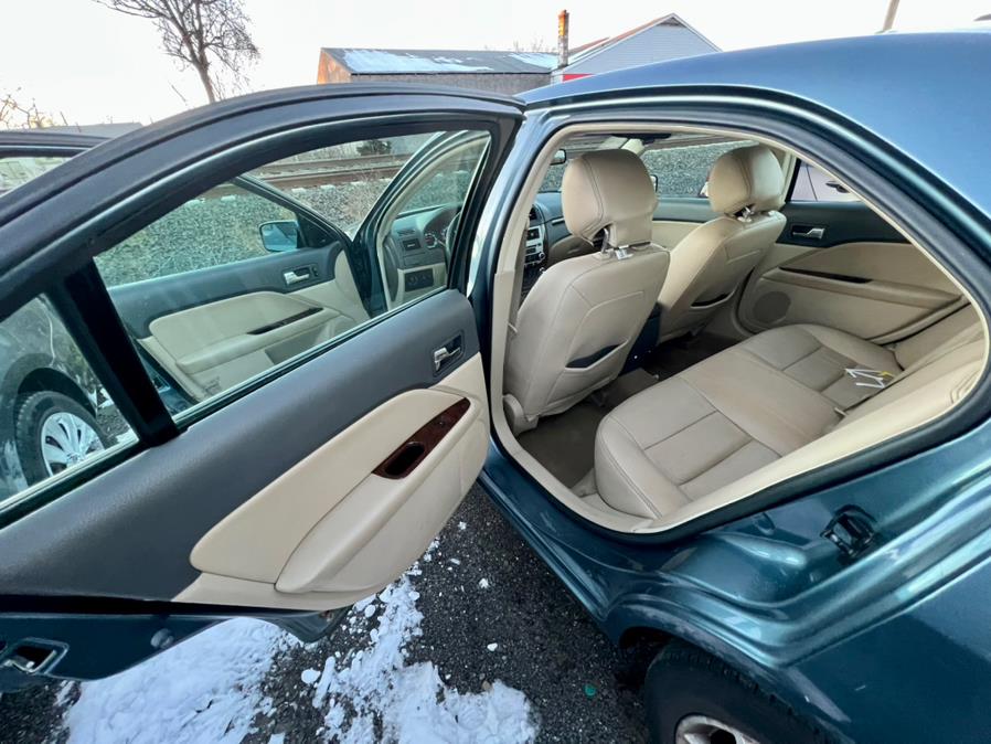 2012 Ford Fusion 4dr Sdn SEL FWD, available for sale in Wallingford, Connecticut | Wallingford Auto Center LLC. Wallingford, Connecticut 2012 Ford Fusion 4dr Sdn SEL FWD, available for sale in Wallingford, Connecticut | Wallingford Auto Center LLC. Wallingford, Connecticut