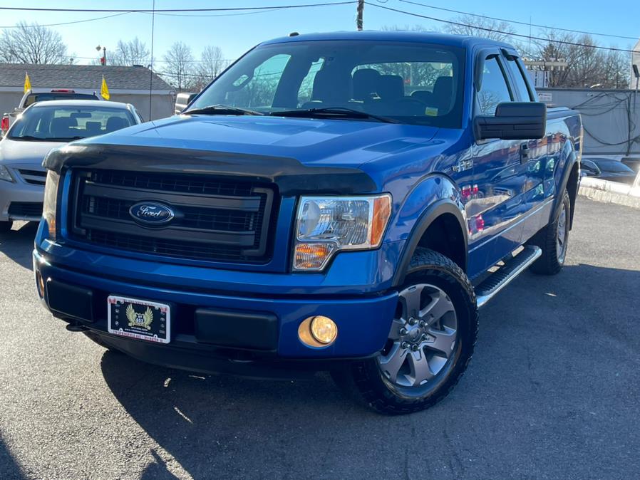 2013 Ford F-150 4WD SuperCab 145" STX, available for sale in Irvington, New Jersey | Elis Motors Corp. Irvington, New Jersey 2013 Ford F-150 4WD SuperCab 145" STX, available for sale in Irvington, New Jersey | Elis Motors Corp. Irvington, New Jersey