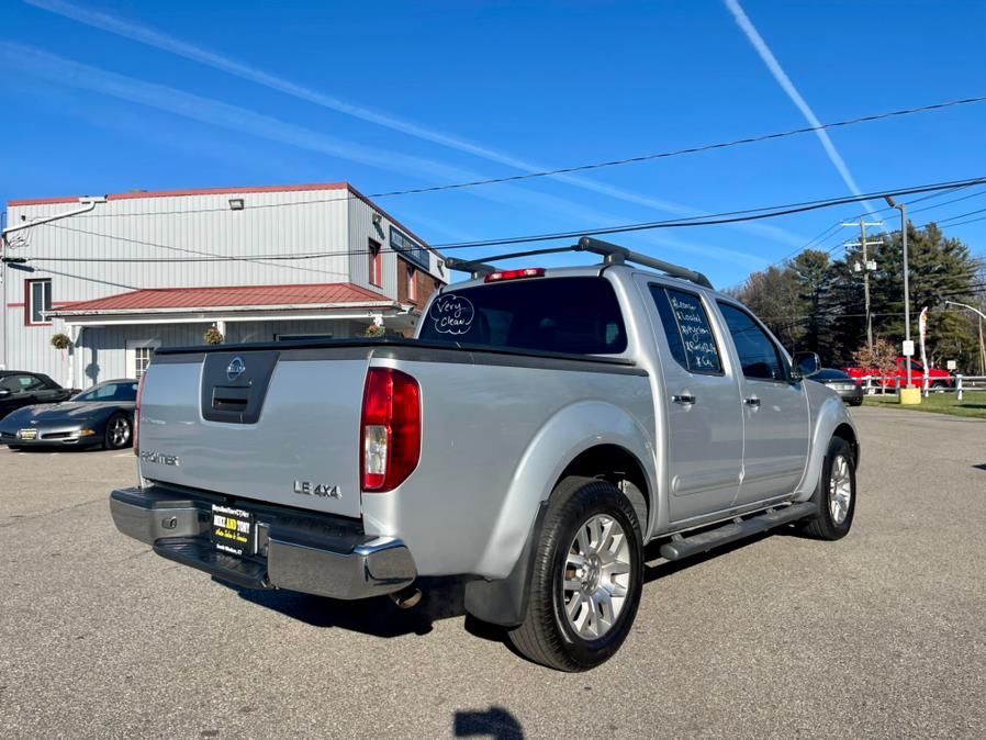 2010 Nissan Frontier 4WD Crew Cab SWB Auto LE, available for sale in South Windsor, Connecticut | Mike And Tony Auto Sales, Inc. South Windsor, Connecticut 2010 Nissan Frontier 4WD Crew Cab SWB Auto LE, available for sale in South Windsor, Connecticut | Mike And Tony Auto Sales, Inc. South Windsor, Connecticut