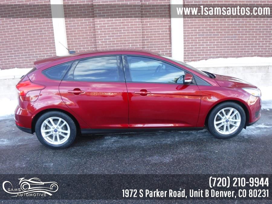 2015 Ford Focus 5dr HB SE, available for sale in Denver, Colorado | Sam's Automotive. Denver, Colorado 2015 Ford Focus 5dr HB SE, available for sale in Denver, Colorado | Sam's Automotive. Denver, Colorado