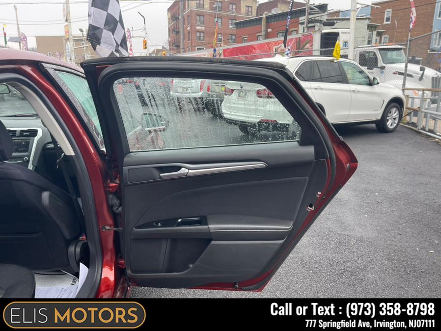 2014 Ford Fusion 4dr Sdn SE FWD, available for sale in Irvington, New Jersey | Elis Motors Corp. Irvington, New Jersey 2014 Ford Fusion 4dr Sdn SE FWD, available for sale in Irvington, New Jersey | Elis Motors Corp. Irvington, New Jersey