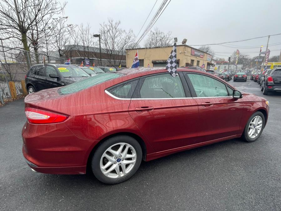 2014 Ford Fusion 4dr Sdn SE FWD, available for sale in Irvington, New Jersey | Elis Motors Corp. Irvington, New Jersey 2014 Ford Fusion 4dr Sdn SE FWD, available for sale in Irvington, New Jersey | Elis Motors Corp. Irvington, New Jersey