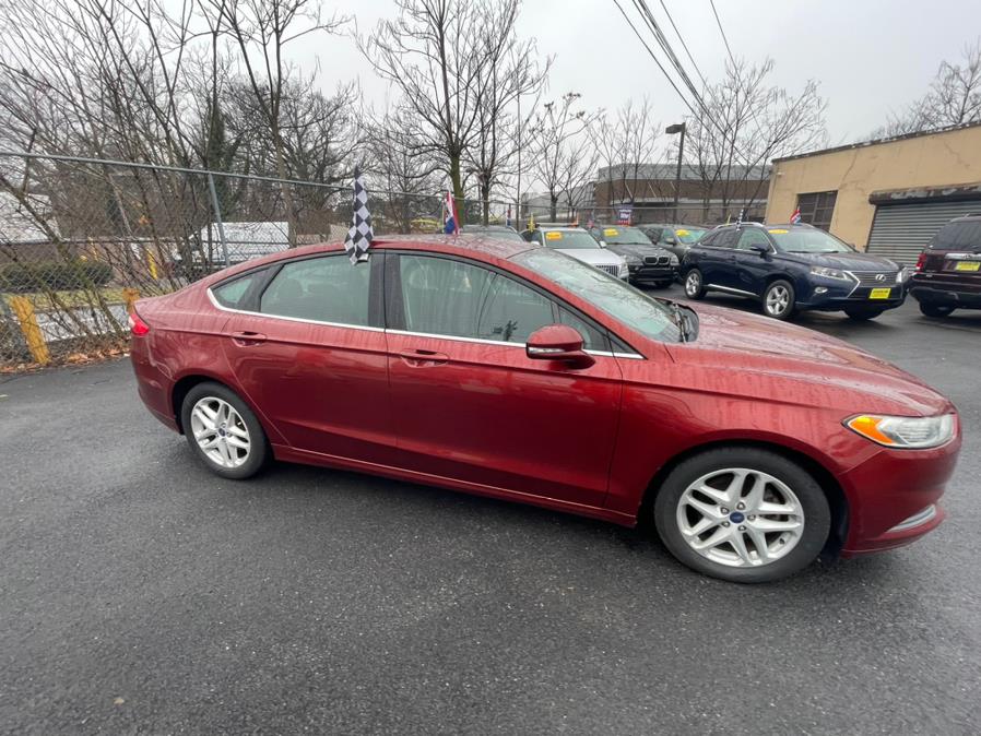 2014 Ford Fusion 4dr Sdn SE FWD, available for sale in Irvington, New Jersey | Elis Motors Corp. Irvington, New Jersey 2014 Ford Fusion 4dr Sdn SE FWD, available for sale in Irvington, New Jersey | Elis Motors Corp. Irvington, New Jersey