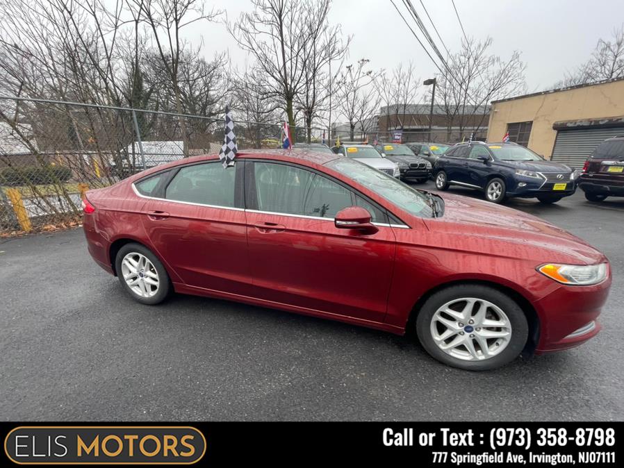 2014 Ford Fusion 4dr Sdn SE FWD, available for sale in Irvington, New Jersey | Elis Motors Corp. Irvington, New Jersey 2014 Ford Fusion 4dr Sdn SE FWD, available for sale in Irvington, New Jersey | Elis Motors Corp. Irvington, New Jersey